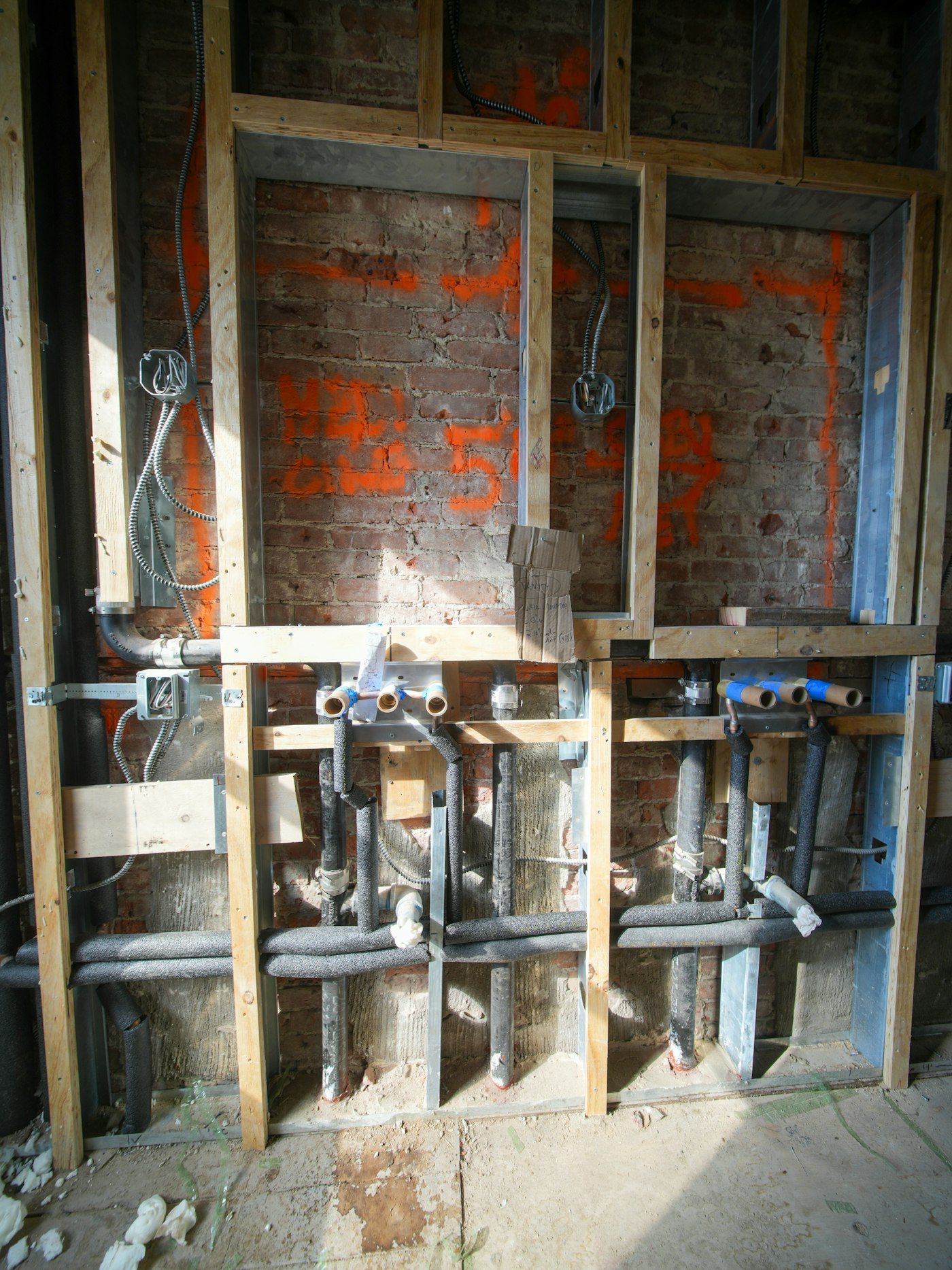 New supply and drain lines inside an open wall