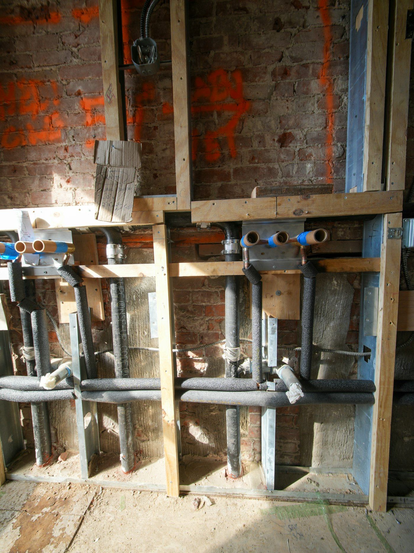 New supply and drain pipes in an open wall