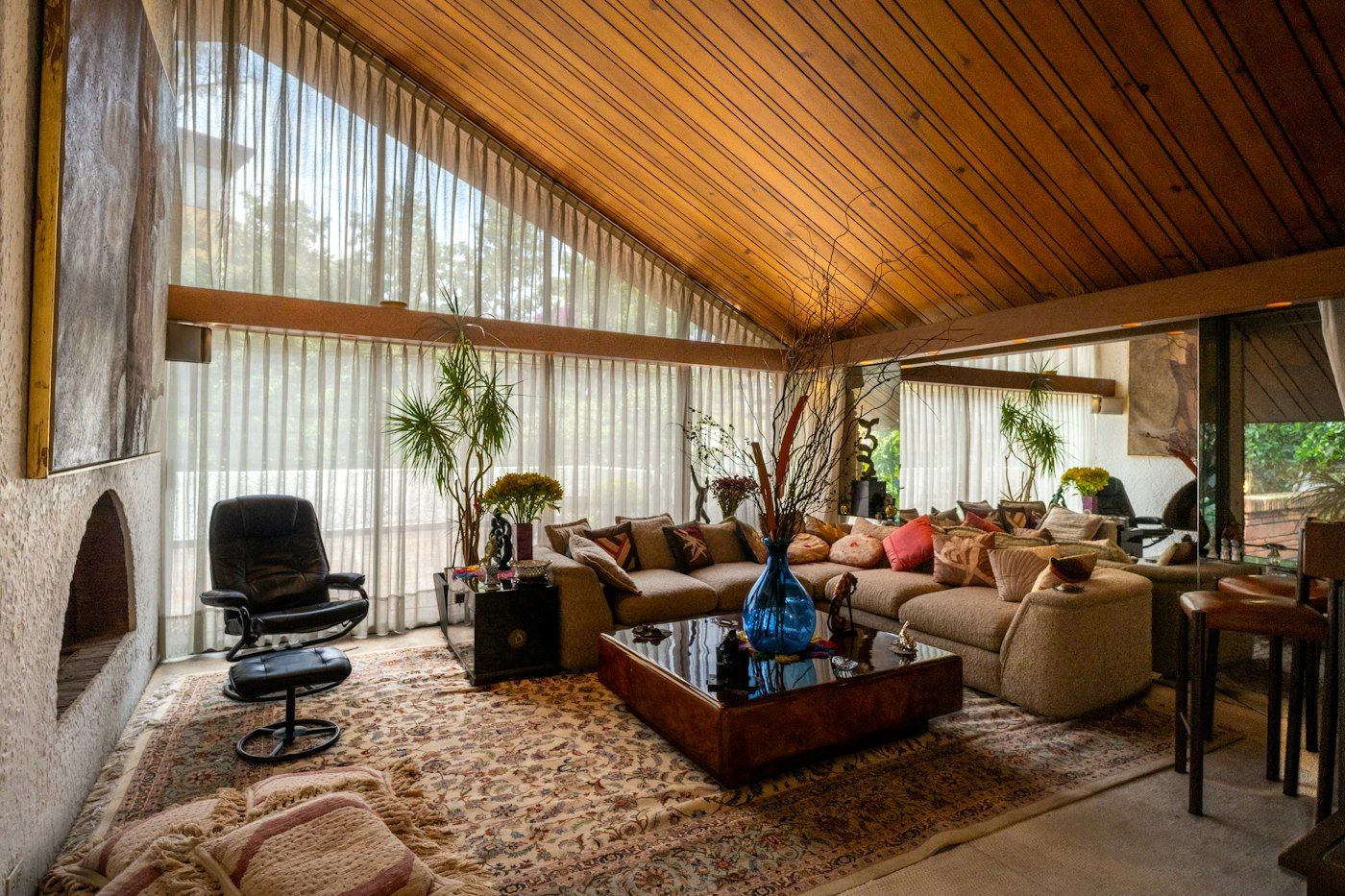 Bright living room with a wall of large clean windows